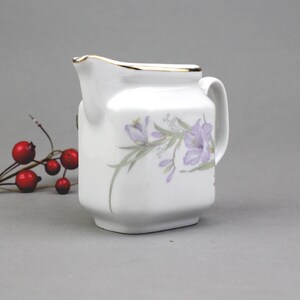 Small vintage white porcelain creamer by Lotus, China