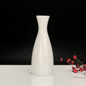 Stylish white porcelain flower vase made in Europe. Collection 1234\0