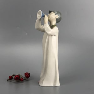 Boy playing flute figurine by Carl Scheidig Grafenthal porcelan from Europe