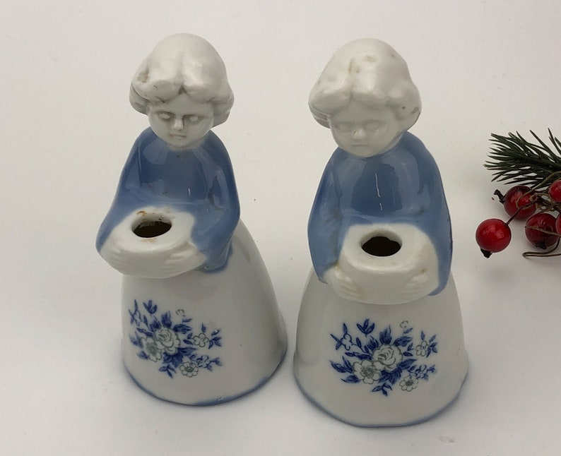 Porcelain set of two women holding bowls Christmas decor