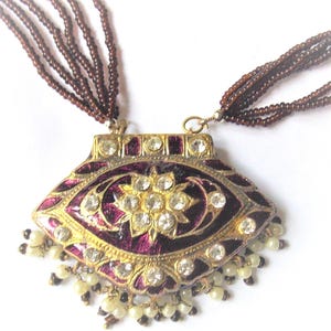 Pendant necklace and matching earrings in LAKH, handcrafted by REINE MARGOT
