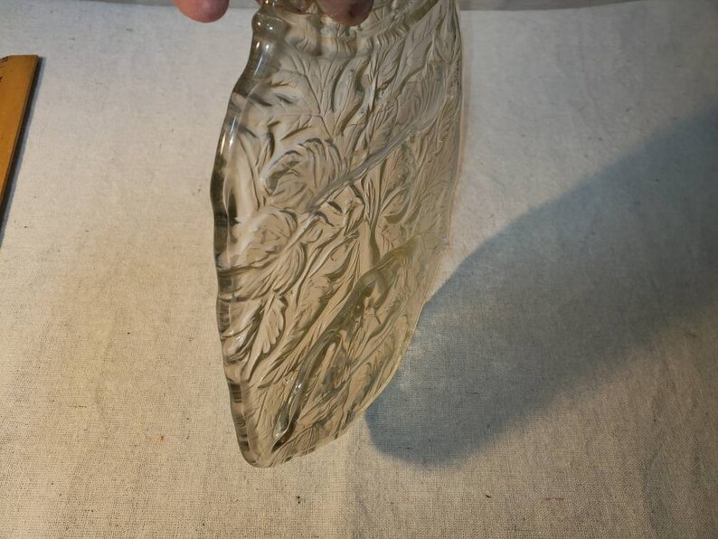 Fused jar with face textered