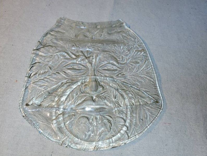 Fused jar with face textered