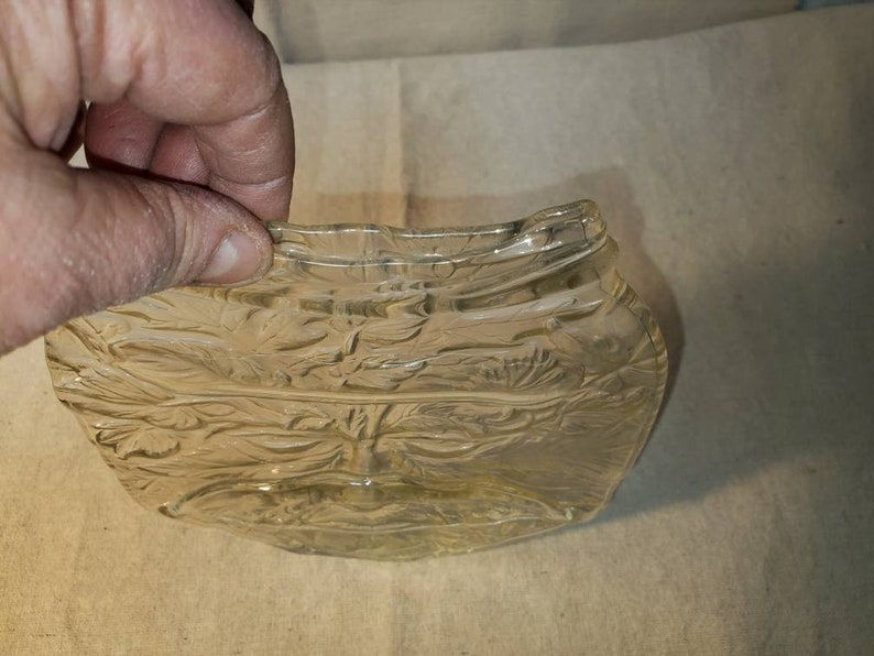 Fused jar with face textered