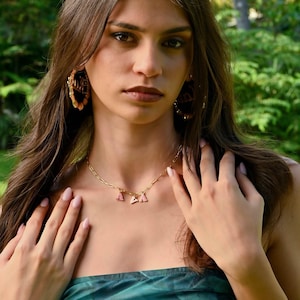 Trendy colorful enamel name necklace styled as statement choker jewelry