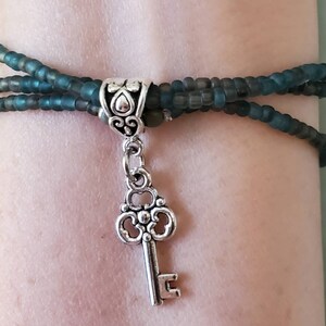 Skeleton Key:  Beaded bracelet, key, charm bracelet, stretch bracelet, gifts for women, gifts for girls