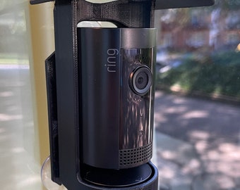 RING Indoor cam sentry // Een verstelbare glazen houder met weersbescherming en kantelspil.