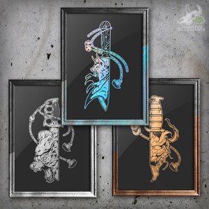 May include: Three framed prints with black backgrounds and silver frames. Each print features a black and white illustration of a knife with a creature's head on the blade. The first print has a blue and green gradient, the second print has a silver gradient, and the third print has a gold gradient. The text "Skulls and Succulents" is in the top right corner of the image.
