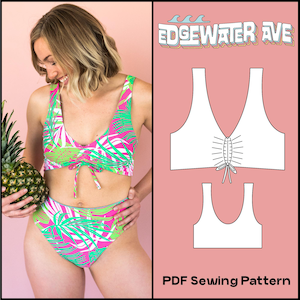 May include: A two-piece swimsuit with a tropical leaf pattern in pink, green, and white. The top has a gathered front with a tie, and the high-waisted bottoms match the top. The image also includes a pineapple and a diagram of the swimsuit pattern.