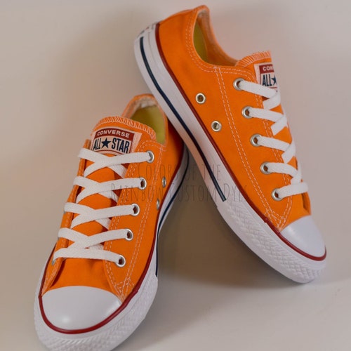 orange chucks low top