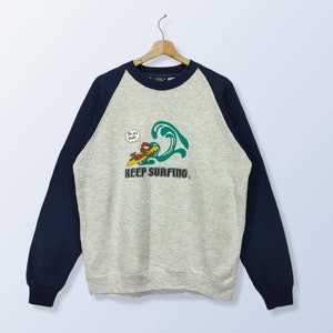 Sweat raglan Keep Surfing, grand pull ras du cou vintage taille L