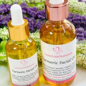 May include: Two clear glass dropper bottles containing golden yellow Turmeric Facial Oil by LenaLoveNaturals. The smaller bottle is labeled 1 fl oz with a gold cap, and the larger bottle is labeled 2 fl oz with a rose gold cap, both featuring white labels.