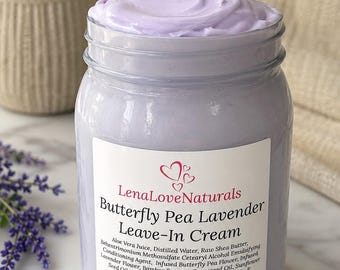May include: A clear plastic jar filled with light purple leave-in cream. The white label reads LenaLoveNaturals Butterfly Pea Lavender Leave-In Cream, lists ingredients including aloe vera and shea butter, and states 15 fl oz at the bottom.