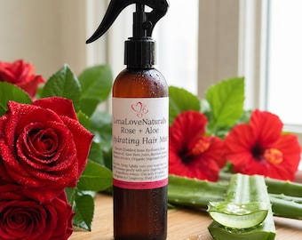 May include: A brown plastic spray bottle containing LenaLoveNaturals Rose + Aloe Hydrating Hair Mist. The white label features black text and a pink accent line. The bottle is 8 fluid ounces and includes ingredients like rose hydrosol and aloe.