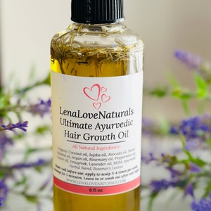 May include: A clear glass bottle with a black cap and a white label. The label reads "Lena Love Naturals Ultimate Ayurvedic Hair Growth Oil" and lists all natural ingredients. The bottle is filled with a yellow liquid and contains herbs. The bottle is 8 fl oz.