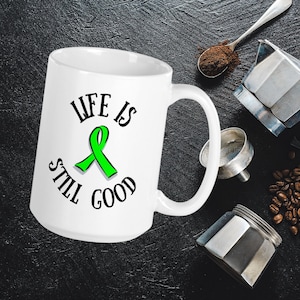 Lyme Disease Awareness Mug: Life Is Still Good, Green Ribbon