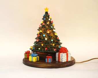 Lighted Translucent Porcelain ChristmasTree with Presents and  Hand Crafted Wooden Base