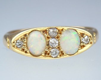 Antieke Edwardiaanse 18k gouden opaal diamantclusterring, 1904