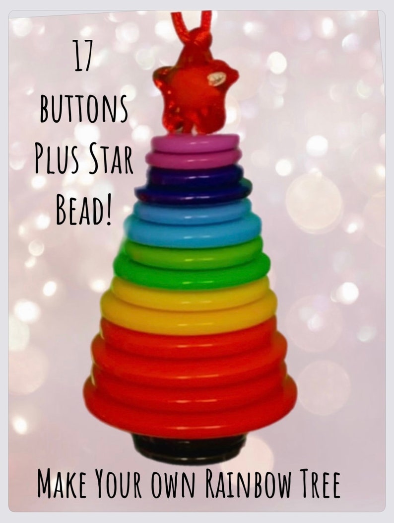 May include: 17 colorful buttons stacked in a rainbow pattern to form a Christmas tree shape, with a red star bead at the top. The text "MAKE YOUR OWN RAINBOW TREE" is at the bottom of the image.