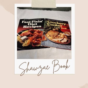 May include: Two vintage Better Homes and Gardens cookbooks. The first cookbook is titled "Fast-Fixin' Diet Recipes" and features a photo of spaghetti and meatballs. The second cookbook is titled "Crockery Cooker Cook Book" and features a photo of a roast with vegetables.