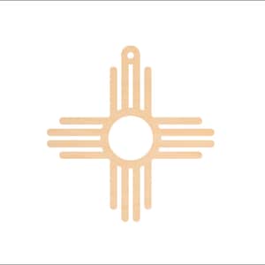 May include: A wooden cutout of the Zia symbol, a traditional symbol of the Pueblo people of New Mexico. The symbol is a stylized sun with four rays, each representing a cardinal direction.
