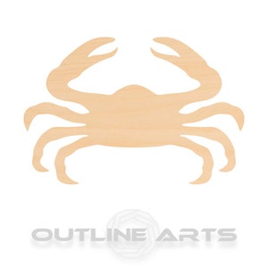 May include: A wooden cutout of a crab in a light brown color. The crab is facing forward with its claws raised.