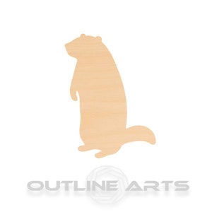 May include: A wooden cutout of a prairie dog standing on its hind legs, facing to the right. The cutout is a light brown color and has a simple, silhouette-like design.