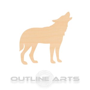 May include: A wooden cutout of a wolf howling at the moon. The cutout is a light brown color and has a simple, silhouette-style design.