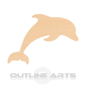 May include: A wooden cutout of a dolphin jumping out of the water. The dolphin is light brown and has a simple design.