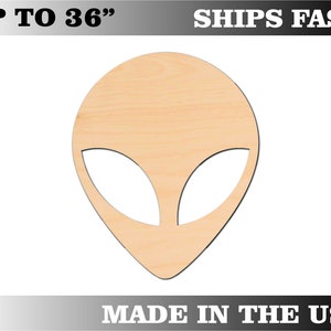 May include: Unpainted wooden cutout of an alien head with large eyes. The cutout is approximately 6 inches tall and is made in the USA.