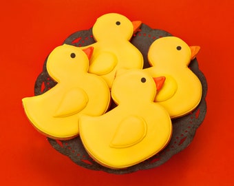 12 galletas glaseadas de patito amarillo: para baby shower, sin lácteos y kosher.