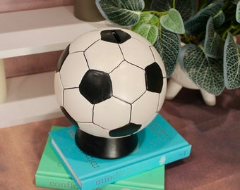 soccer ball money box with plug