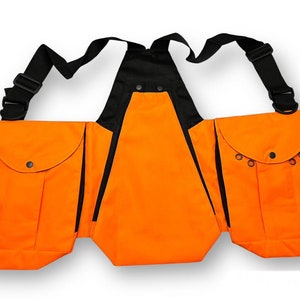 May include: Orange hunting vest with three pockets and adjustable straps. The vest has a black trim and a black back panel.