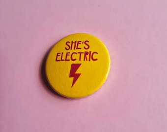 She's electric 25mm badge