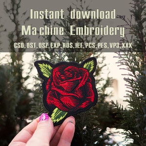 May include: A red rose embroidery design in a machine embroidery file format. The design is shown on a green fabric patch. The file formats included are CSD, OST, OSZ, EXP, HUS, JEF, PCS, PES, VP3, and XXX.