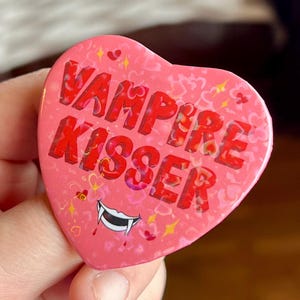 Vampire Kisser , Holographic Heart Shaped Badge , inspired by BG3 Astarion , DnD inspired badge