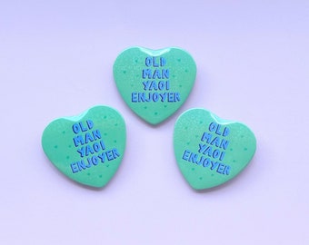 Old Man Yaoi Enjoyer , Holographic Heart Shaped Badge