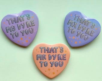that's mr dyke to you , Holographic Heart Shaped Badge , queer merch for queer people