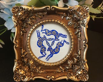 Original Hand painted Blue and white Three Hares framed art,rabbit,bunny painting.
