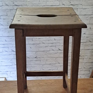 1940s stained brown wooden stool / occasional furniture decoration kitchen workshop veranda / square solid wood stool with hole in the seat