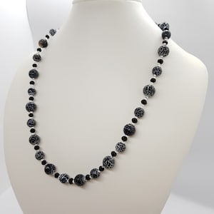 Set in Volcanic Agate. Handmade semi-precious stone necklace, bracelets and earrings.