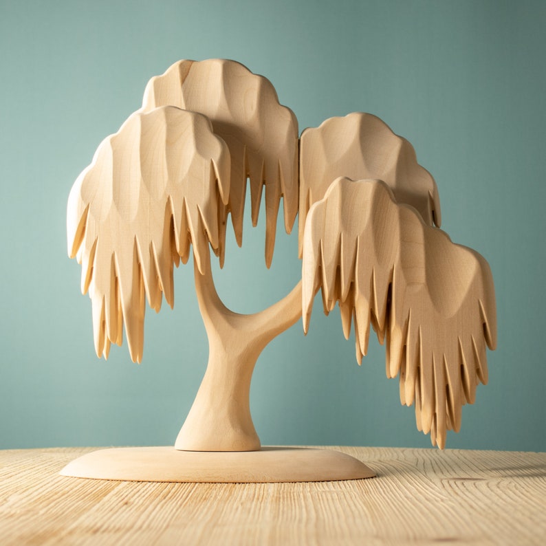 Wooden Montessori and Waldorf willow tree toy, emphasizing imaginative play and nature appreciation.