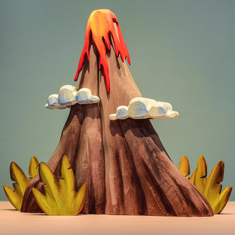 Aesthetic wooden volcano with artistic lava detail and cloud figures, providing a visual and educational centerpiece for playtime.