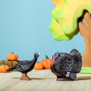Two Wooden Turkey Hen Figurines, detailed craftsmanship, engaging Montessori educational toys