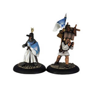 May include: Two painted miniature figures, one a knight in white armour with a blue and white shield, the other a peasant carrying a large pack on their back.