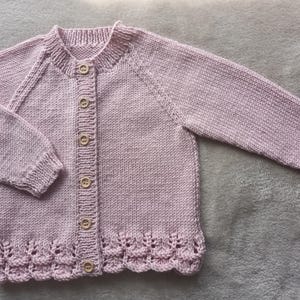 Little girls cardigan hand-knitted in a soft smooth pale dusky pink baby yarn to fit approx 1-2 years