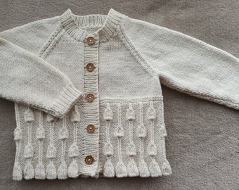 Little girls cardigan hand-knitted in a pale cream yarn to fit approx 1-2 years