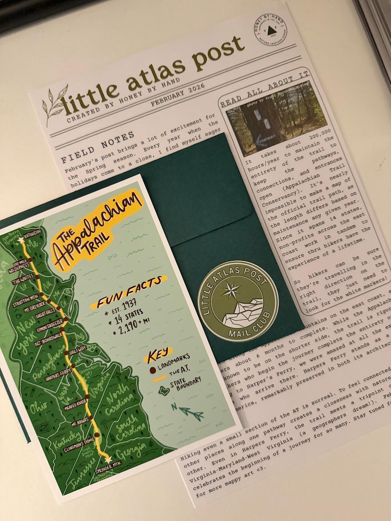 May include: A collection of stationery items featuring a map of the Appalachian Trail, a newsletter, and a mail club sticker. The map highlights landmarks and states along the trail. The newsletter includes text about the trail and its maintenance.