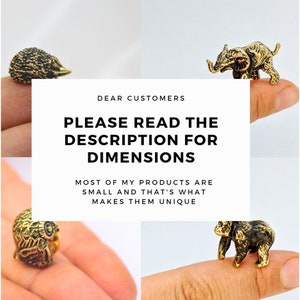 May include: Four small, gold-colored animal figurines: a hedgehog, an elephant, an owl, and a monkey. The figurines are displayed on a finger, with a white background that reads "DEAR CUSTOMERS PLEASE READ THE DESCRIPTION FOR DIMENSIONS MOST OF MY PRODUCTS ARE SMALL AND THAT'S WHAT MAKES THEM UNIQUE".