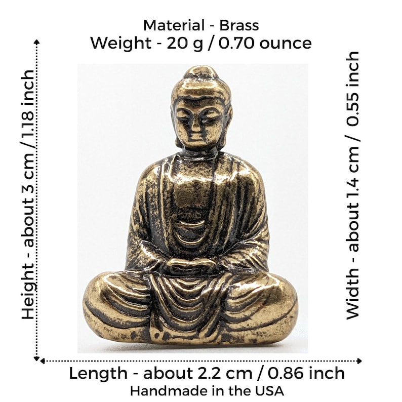 May include: A small, gold-colored brass Buddha statue sitting in a meditative pose. The statue is about 3 inches tall and weighs 0.70 ounces.